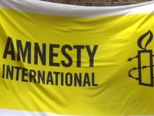 Une bâche pour les 50 ans d'Amnesty International