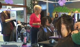 Action d'un coiffeur hutois