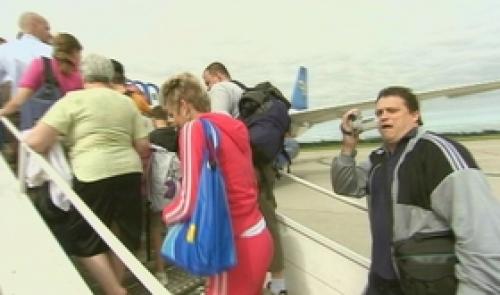 Mauvais temps : les Liégeois en quête de soleil