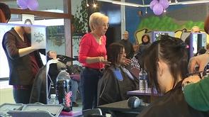 Action d'un coiffeur hutois